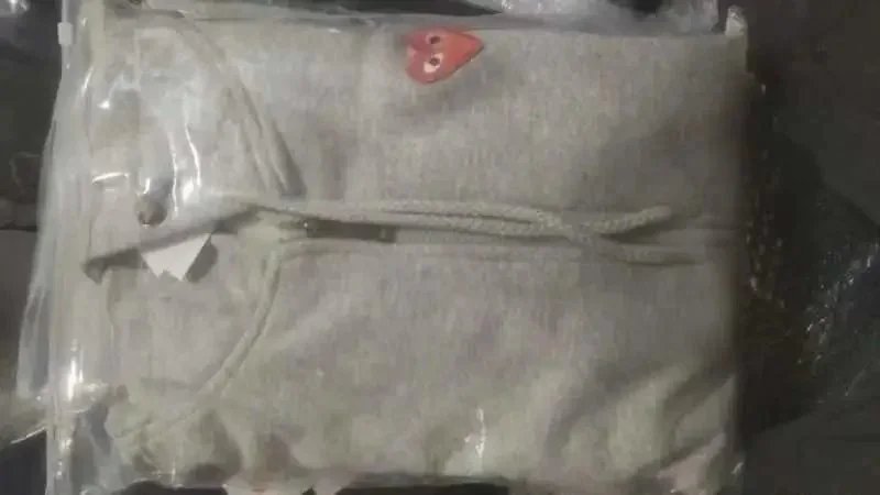 Front small red heart looped cardigan gray